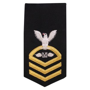 Navy E7 Female Rating Badge: AB Aviation Boatswains Mate, seaworthy gold on blue