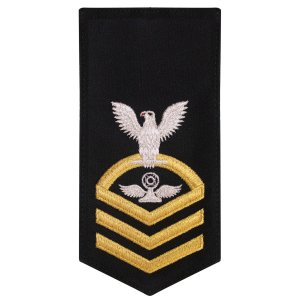 Navy E7 Female Rating Badge: AC Air Traffic Controller, seaworthy gold on blue