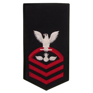 Navy E7 Female Rating Badge: AO Aviation Ordnanceman, seaworthy red on blue