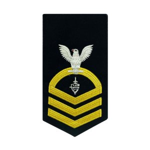 Navy E7 Female Rating Badge: CWT Cyber Warfare Technician, seaworthy gold on blue
