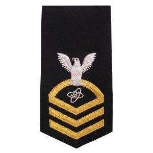 Navy E7 Female Rating Badge: ET Electronics Technician, seaworthy gold on blue