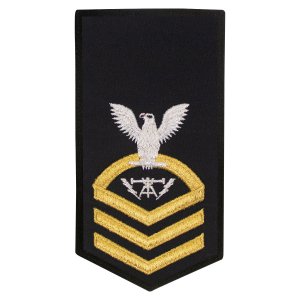 Navy E7 Female Rating Badge: FC Fire Controlman, seaworthy gold on blue