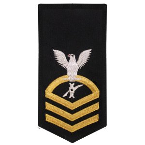 Navy E7 Female Rating Badge: LN Legalman, seaworthy gold on blue