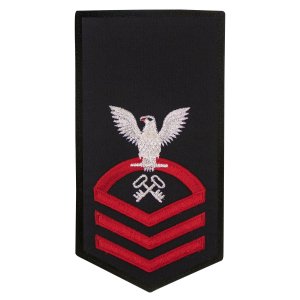Navy E7 Female Rating Badge: LS Logistics Specialist, seaworthy red on blue