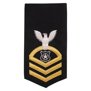 Navy E7 Female Rating Badge: MA Master at Arms, seaworthy gold on blue