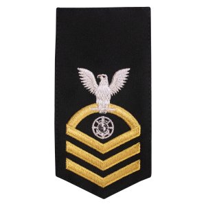 Navy E7 Female Rating Badge: RP Religious Programs Specialist, seaworthy gold on blue