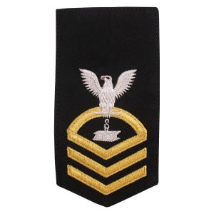 Navy E7 Female Rating Badge: SW Steelworker, seaworthy gold on blue