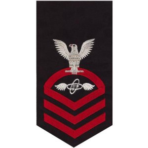 Navy E7 Male Rating Badge: Aviation Electronics Technician, seaworthy red on blue
