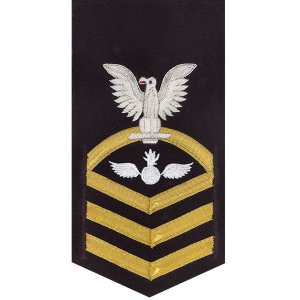 Navy E7 Male Rating Badge: Aviation Ordnanceman, vanchief on blue