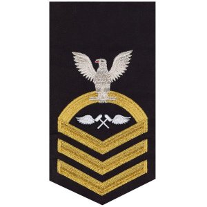 Navy E7 Male Rating Badge: Aviation Structure Mechanic, seaworthy gold on blue