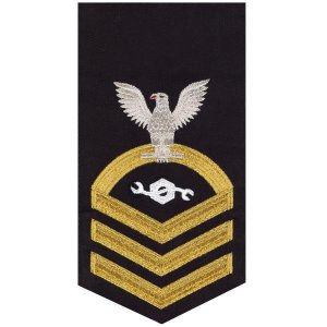 Navy E7 Male Rating Badge: Construction Mechanic, seaworthy gold on blue