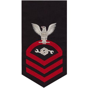 Navy E7 Male Rating Badge: Construction Mechanic, seaworthy red on blue