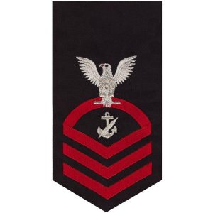 Navy E7 Male Rating Badge: Counselor, seaworthy red on blue