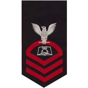 Navy E7 Male Rating Badge: Culinary Specialist, seaworthy red on blue