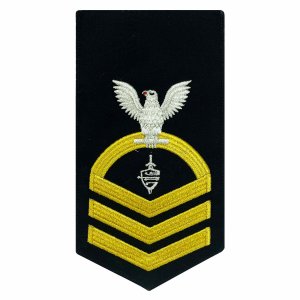 Navy E7 Male Rating Badge: CWT Cyber Warfare Technician, seaworthy gold on blue