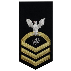 Navy E7 Male Rating Badge: Electronics Technician, seaworthy gold on blue