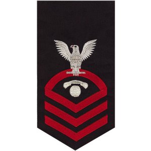 Navy E7 Male Rating Badge: Interior Communications Electrician, seaworthy red on blue