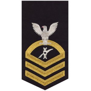 Navy E7 Male Rating Badge: Legalman, seaworthy gold on blue