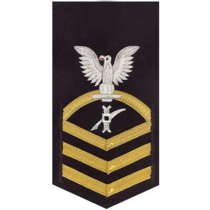 Navy E7 Male Rating Badge: Legalman, vanchief on blue