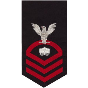 Navy E7 Male Rating Badge: Mineman, seaworthy red on blue