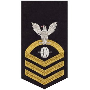 Navy E7 Male Rating Badge: Opticalman, seaworthy gold on blue