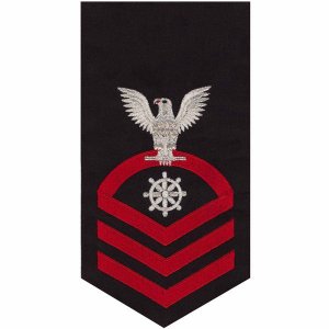 Navy E7 Male Rating Badge: Quartermaster, seaworthy red on blue