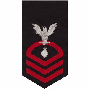 Navy E7 Male Rating Badge: Utilitiesman, seaworthy red on blue