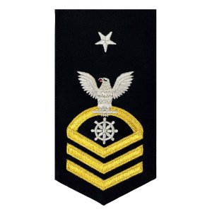 Navy E8 Female Rating Badge: QM Quartermaster, seaworthy gold on blue