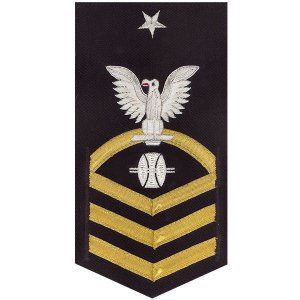 Navy E8 Male Rating Badge: Opticalman, vanchief on blue