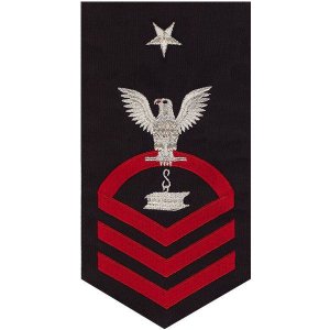 Navy E8 Male Rating Badge: Steelworker, seaworthy red on blue