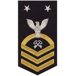 Navy E9 Male Rating Badge: Storekeeper / Logistics, seaworthy gold on blue