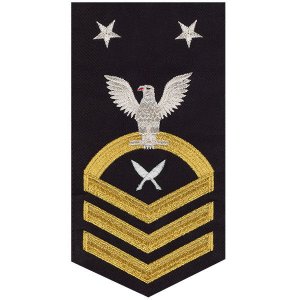 Navy E9 Male Rating Badge: Yeoman, seaworthy gold on blue