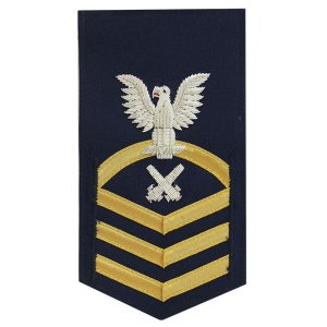 Coast Guard E7 Male Rating Badge: Gunners Mate, blue
