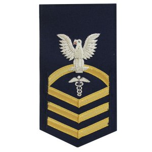 Coast Guard E7 Male Rating Badge: Health Service Technician, blue